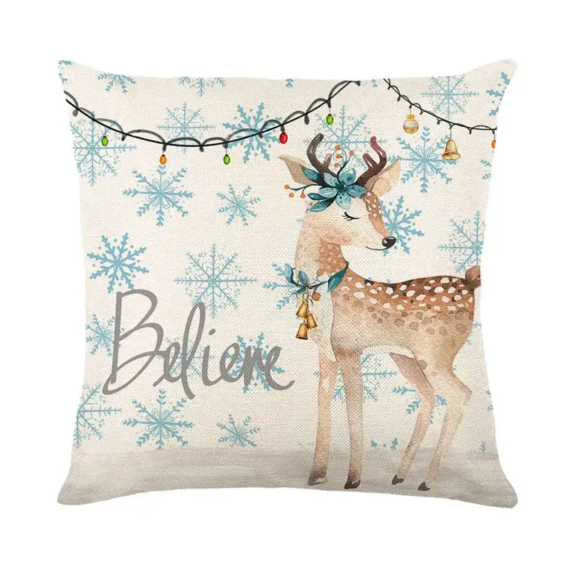 Beige linen pillow cover featuring decorbites christmas letter print with teal floral deer wreath for holiday decor