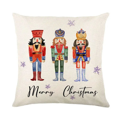 Cream-colored linen pillow cover with christmas letter print featuring nutcrackers and merry christmas script by decorbites christmas letter