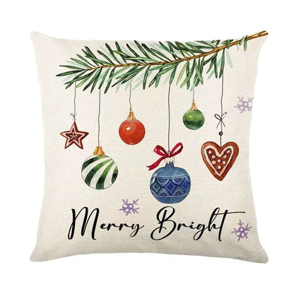 Beige linen pillow cover with decorbites christmas letter print featuring festive ornaments and merry bright script