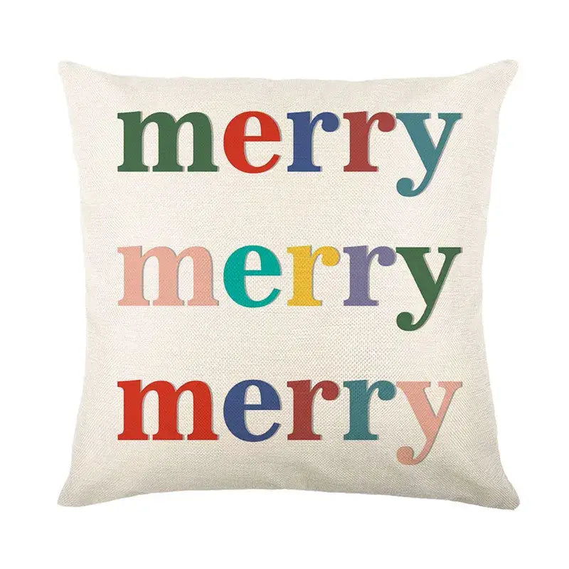 Cozy off-white linen pillow cover with merry printed thrice in playful colors decorbites christmas letter print design