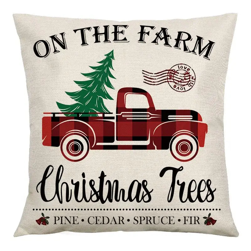 Beige linen cushion cover featuring red black plaid truck with christmas tree and on the farm text by decorbites christmas linen