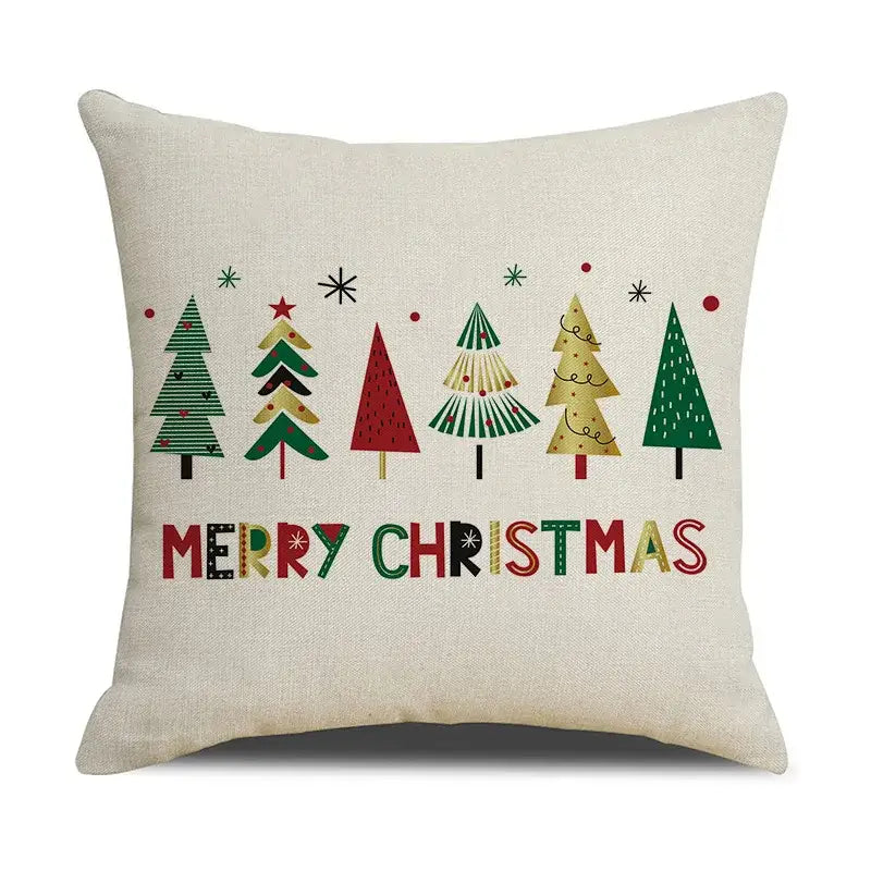 Beige linen cushion cover with stylized christmas trees and merry christmas phrase by decorbites christmas linen