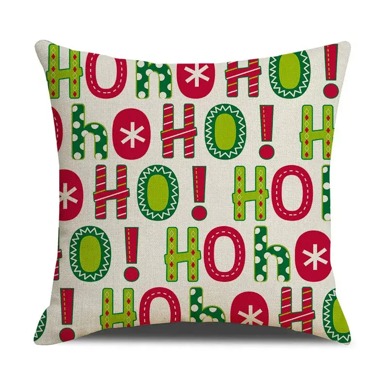 DecorBites christmas linen cushion cover with ho ho ho pattern in red green white on beige linen for festive home decor