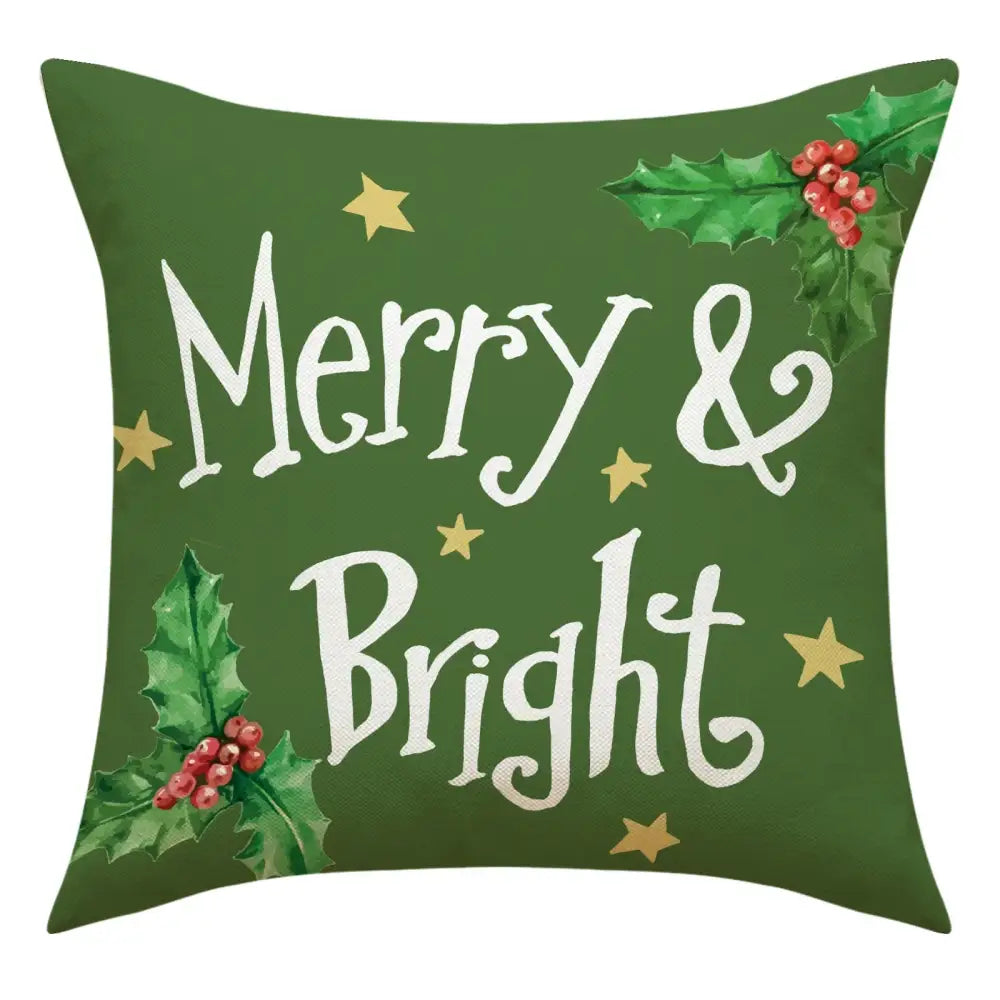 Green christmas linen decorative throw pillow with merry and bright white script gold stars and holly berry clusters