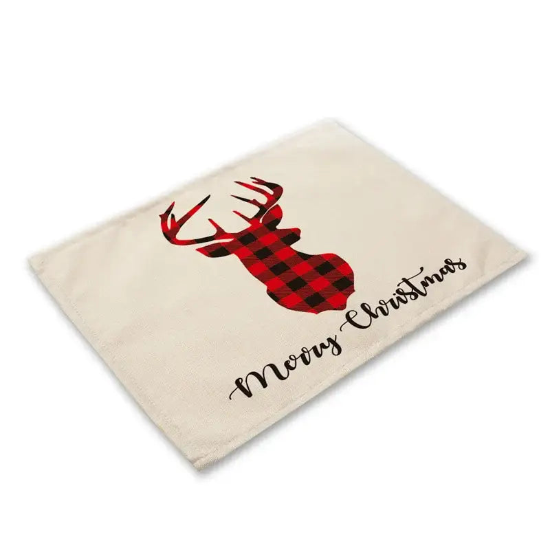 Beige cotton linen dining table mat featuring a red and black plaid deer silhouette with merry christmas script