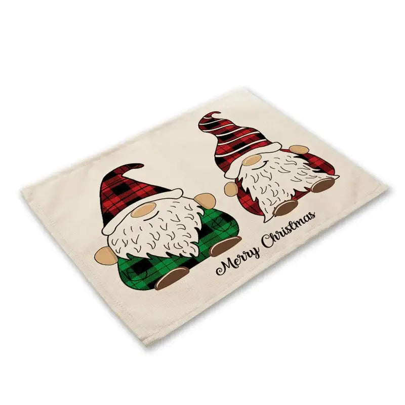 Cream-colored linen dining table mat with two cartoon gnomes and merry christmas script for festive decor