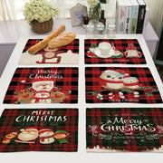 Set of six decorbites™ festive red and black plaid linen dining table mats with santa and holiday characters print
