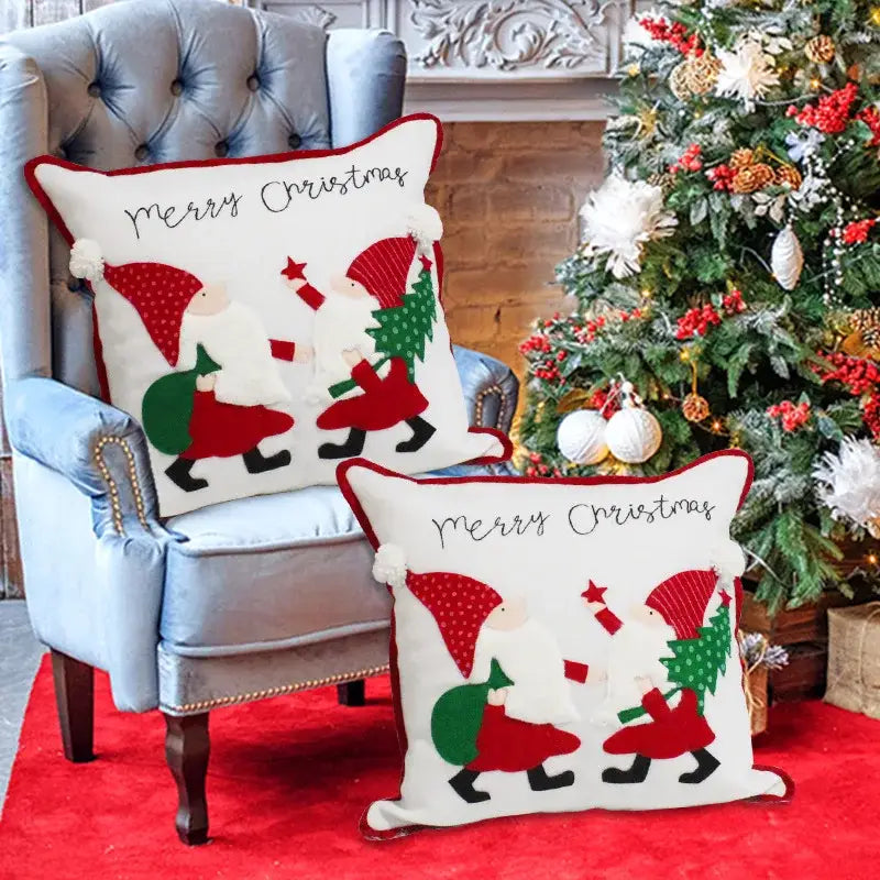 White decorbites christmas patchwork pillow covers with embroidered santa figures merry christmas script and pom-pom trim