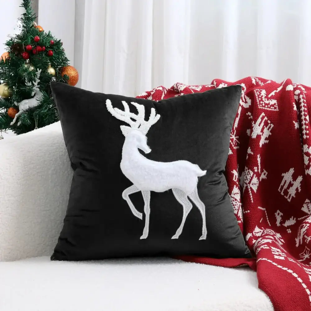 Black velvet cushion cover with white embroidered reindeer from decorbites christmas patchwork merrychristmas collection