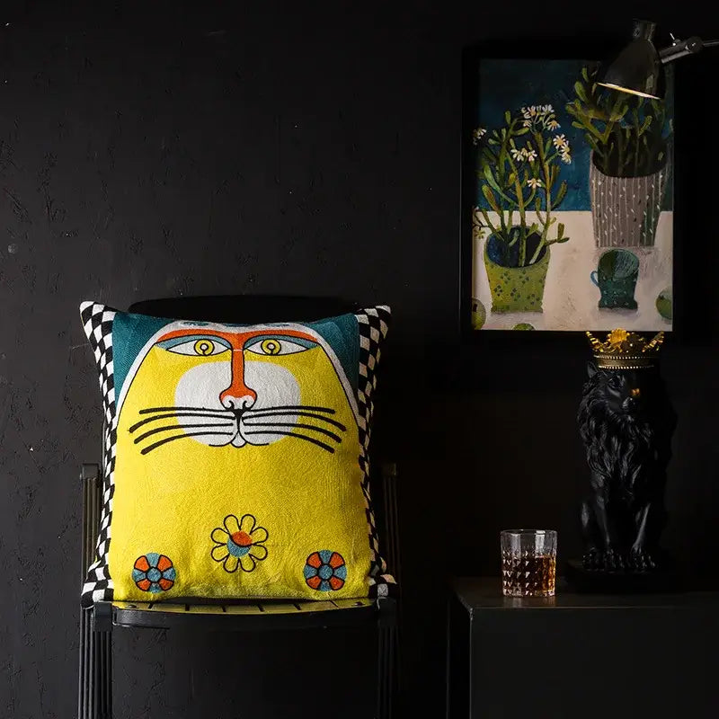 Bright yellow DecorBites Christmas Picasso style cushion cover with embroidered cat face and floral motifs for sofa and bed
