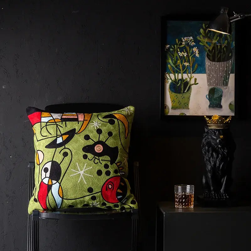 Vibrant green decorbites christmas picasso style cushion cover with abstract colorful patterns and red accents