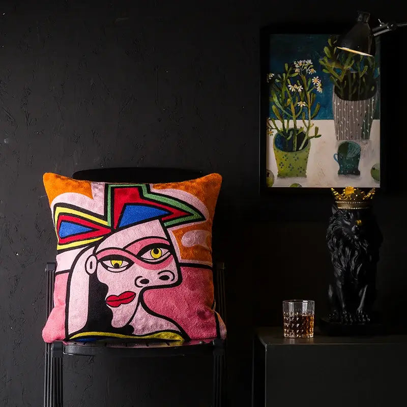 Vibrant plush cushion cover with christmas picasso style abstract portrait in bold colors by DecorBites for sofa and bed