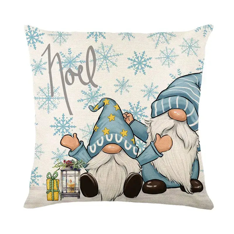 Beige decorbites christmas pillowcase featuring two blue gnome illustrations and the word noel with snowflakes
