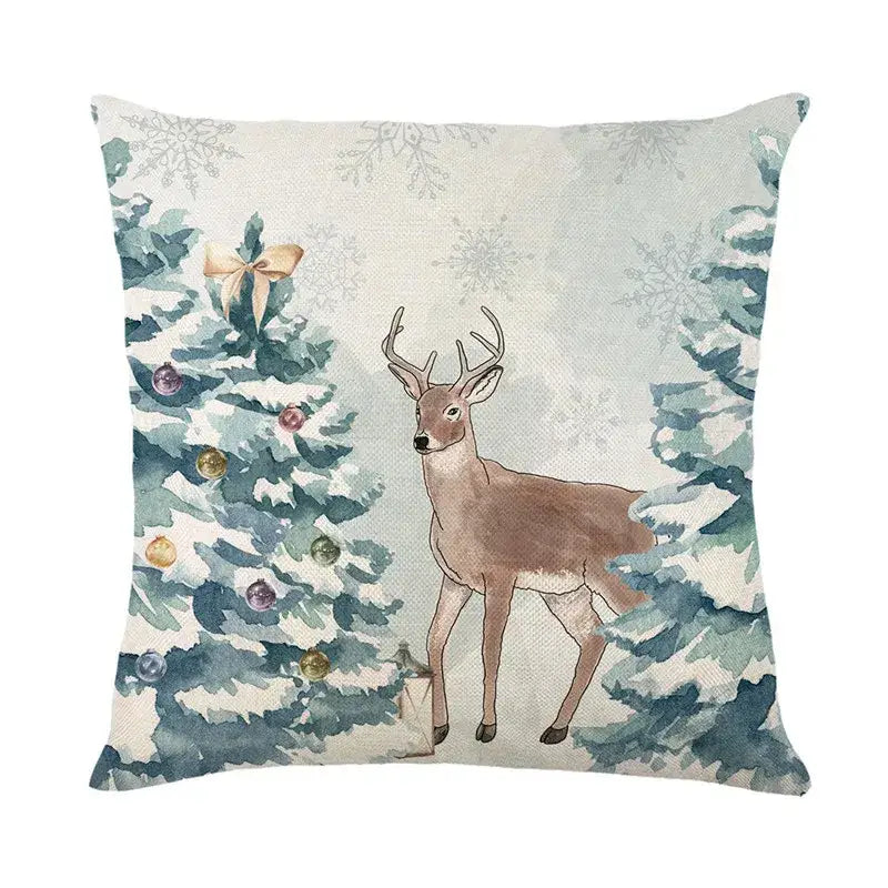 A cozy beige decorbites christmas pillowcase featuring a brown deer beside festive snow-covered evergreen trees