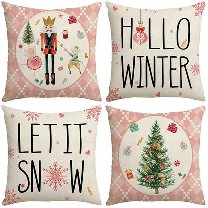 Set of four decorbites christmas pillowcase collection in soft pink and cream with festive holiday designs
