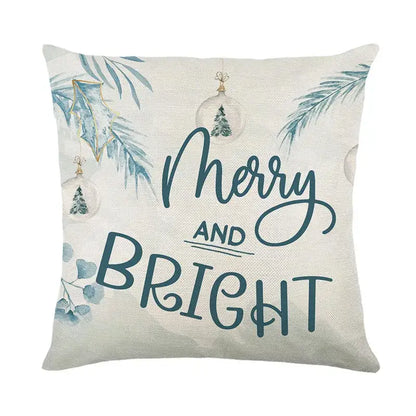 Beige linen throw pillow from decorbites christmas pillowcase collection with merry and bright teal script and festive holly leaves
