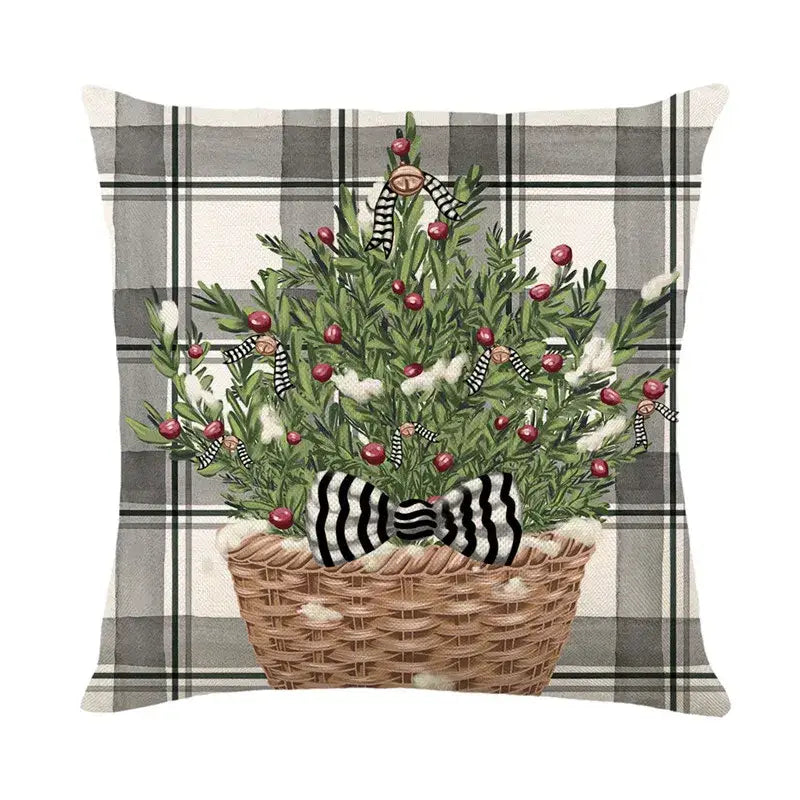 Plaid-patterned decorbites christmas pillowcase with woven basket greenery red berries and black and white striped bow