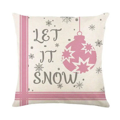 Cozy cream-colored decorbites christmas pillowcase featuring pink christmas ornament and let it snow script design