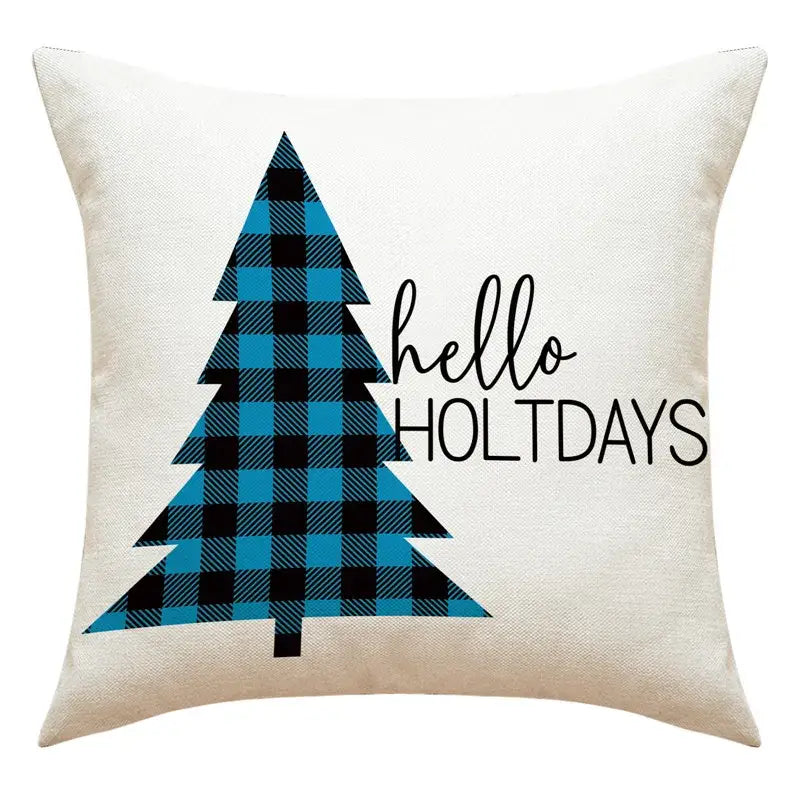 Cream-colored throw pillow with blue and black plaid christmas tree and hello holt days text for living room decor