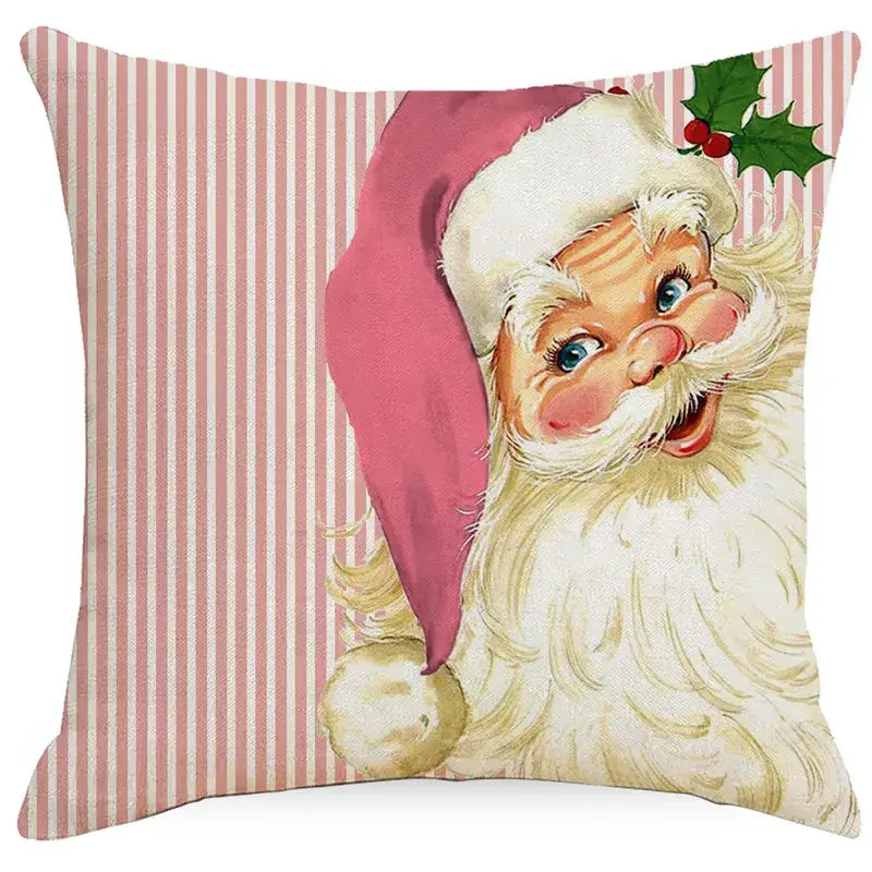 Square throw pillow with vintage santa claus illustration and snowman print on pink striped fabric for living room decor