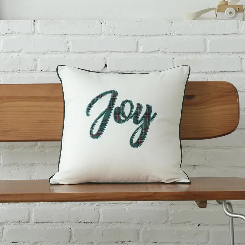 White square cotton cushion cover with joy embroidered in green and red plaid and black piping by decorbites christmas plaid with snowflake embroidery