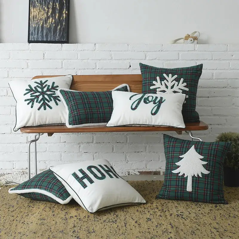 Set of DecorBites christmas plaid cotton cushion covers in green and white with snowflake embroidery and festive designs