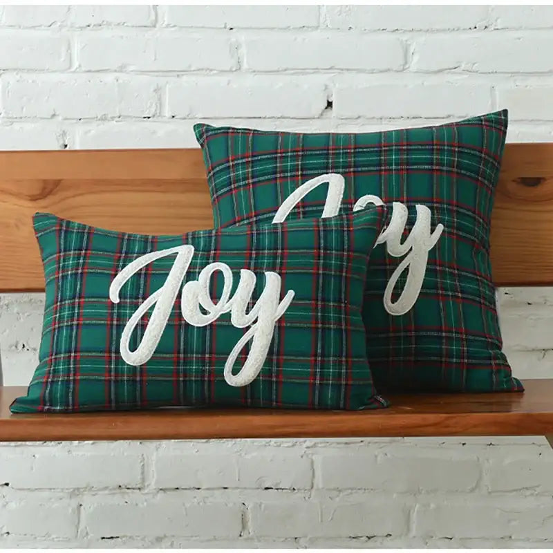 Green plaid cotton canvas cushion cover with white joy embroidery and snowflake details by decorbites christmas plaid