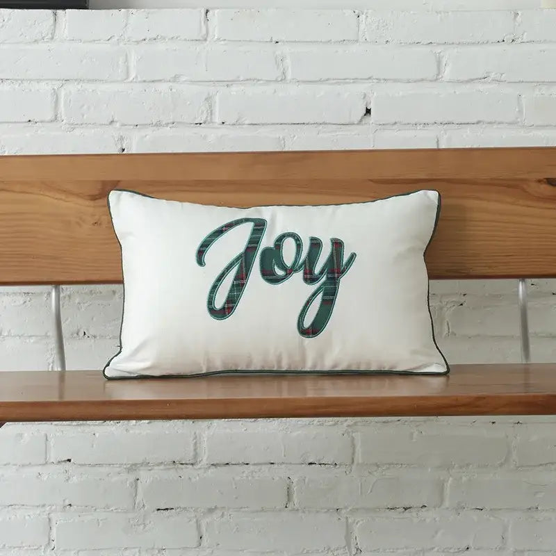 White rectangular cushion cover with green plaid joy embroidery and dark green piping from decorbites christmas plaid cotton collection