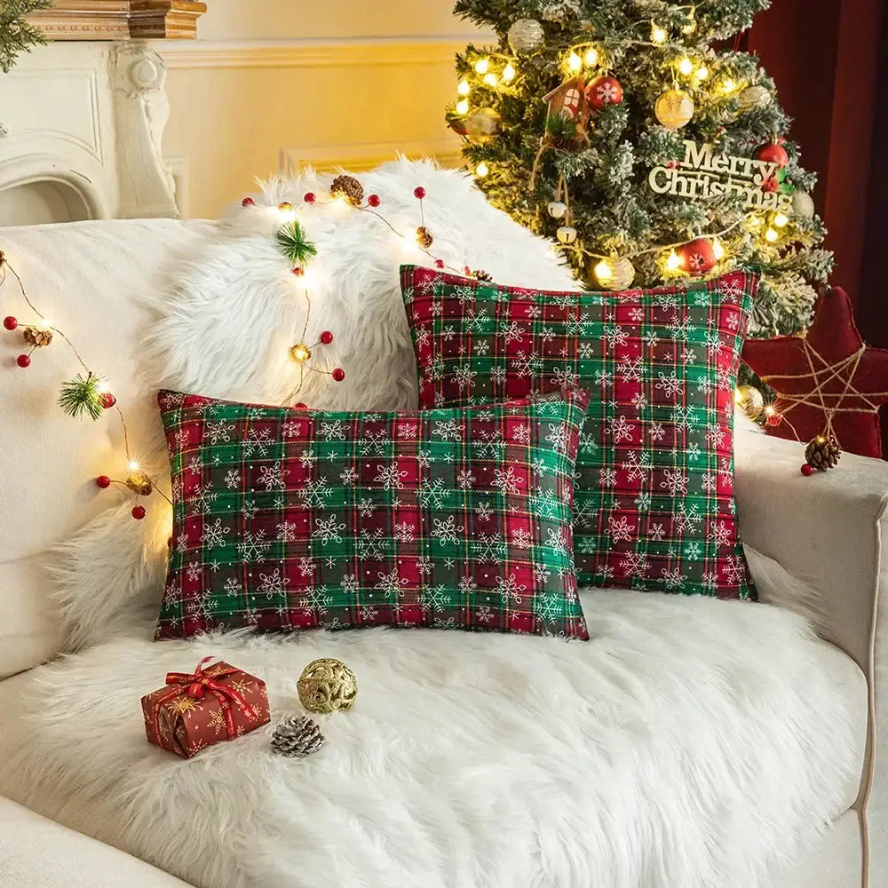 Red and green plaid cushion cover with white snowflake patterns from decorbites christmas plaid collection for home decor