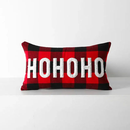 Red and black plaid cushion cover with white embroidered ho ho ho text from decorbites christmas plaid collection