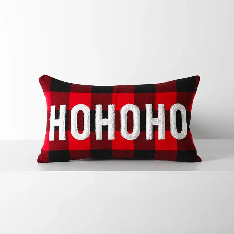 Red and black plaid cushion cover with white embroidered ho ho ho text from decorbites christmas plaid collection