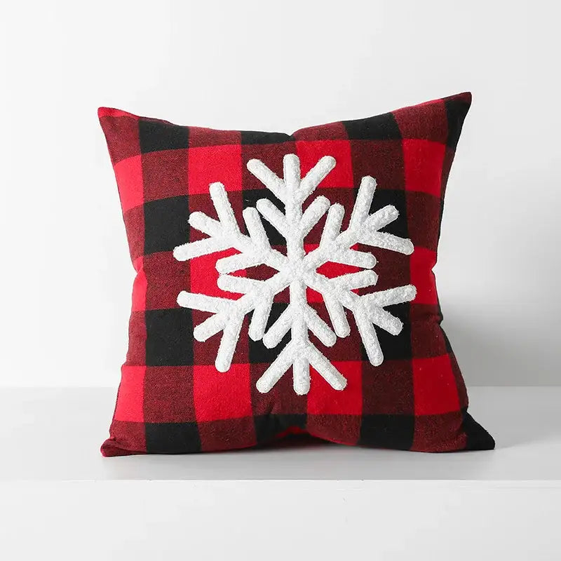 Red and black plaid cushion cover with white textured snowflake appliqué from decorbites christmas plaid collection
