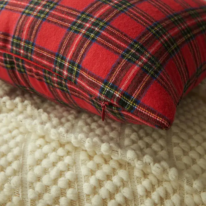 Red plaid decorbites christmas plaid print pillow case set with black green and blue stripes on textured fabric surface