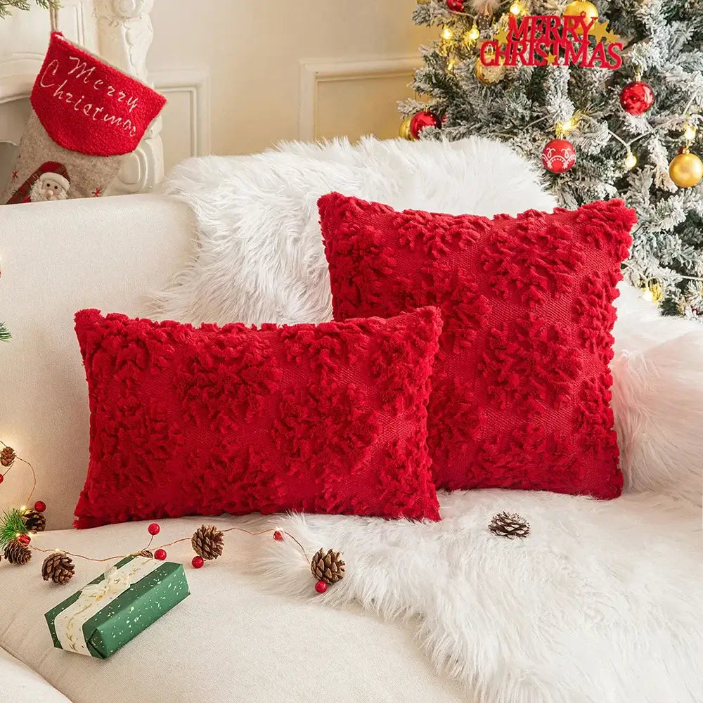 Vibrant red decorbites christmas plush textured throw pillows with a plush fuzzy surface for festive holiday decor