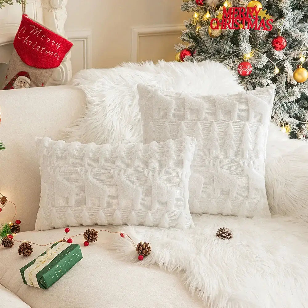Decorbites christmas plush white textured throw pillows with embroidered reindeer on fur sofa for holiday decor