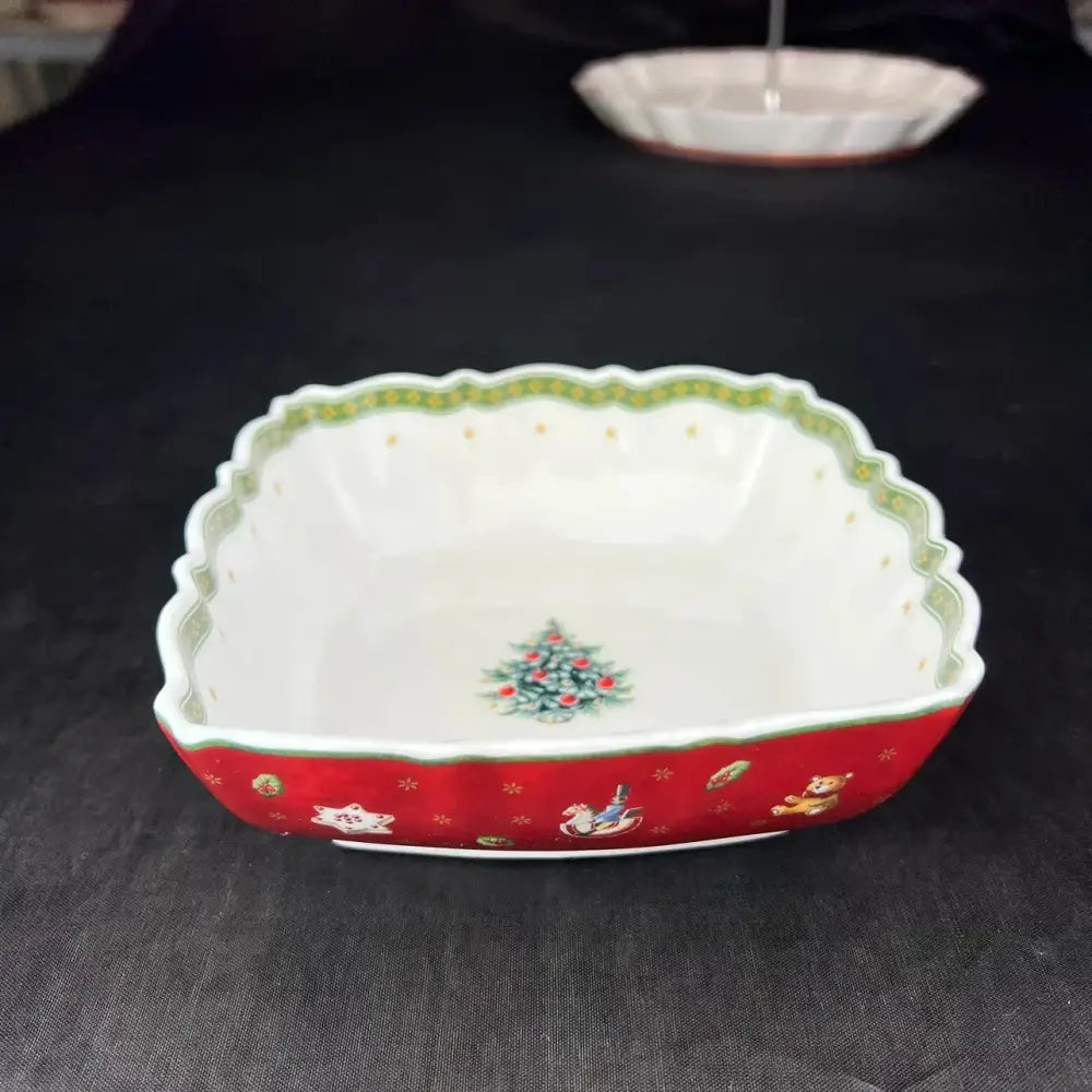 Red and white ceramic christmas porcelain tableware set with scalloped edges and festive teddy bear and tree illustrations