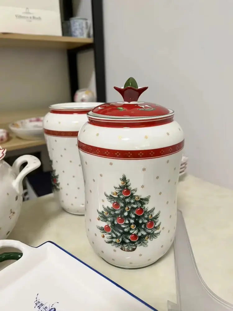 White ceramic christmas porcelain canister with red leaf lid and green tree design from decorbites christmas porcelain tableware set