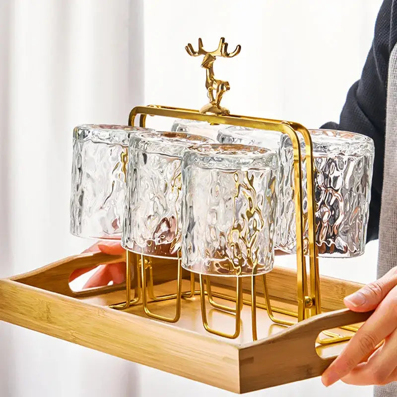 Gold deer-top cups holder set with textured clear glass cups and bamboo tray for drying from decorbites