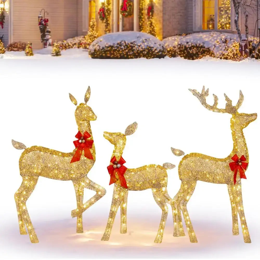 Three illuminated golden deer figurines with red bows and led lights by DecorBites Christmas reindeer outdoor decor