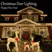 Golden led light outdoor decorbites christmas reindeer elk figurines with red bows and antlers in front of decorated house