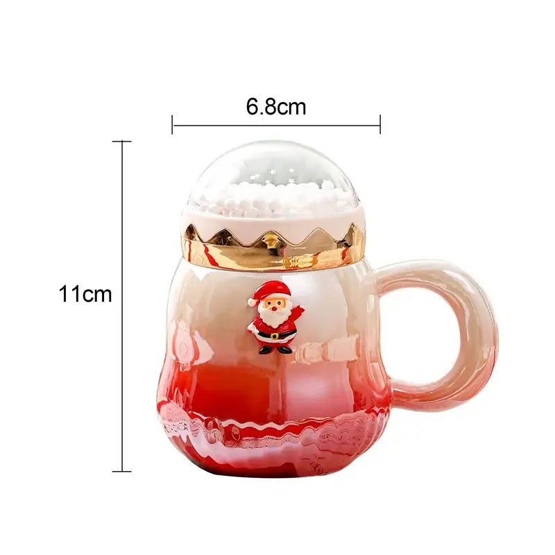 Festive red and clear ceramic mug with gold-trimmed dome lid and santa figurine decorbites christmas santa gift