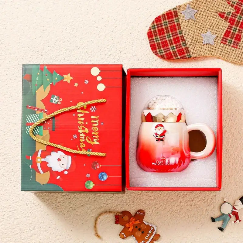 Red gradient ceramic mug with santa claus design and clear dome lid filled with marshmallows decorbites christmas santa