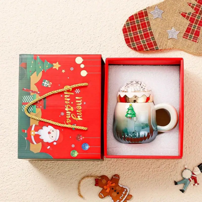 DecorBites Christmas Santa ceramic mug with lid featuring snowy landscape and green tree in red holiday gift box