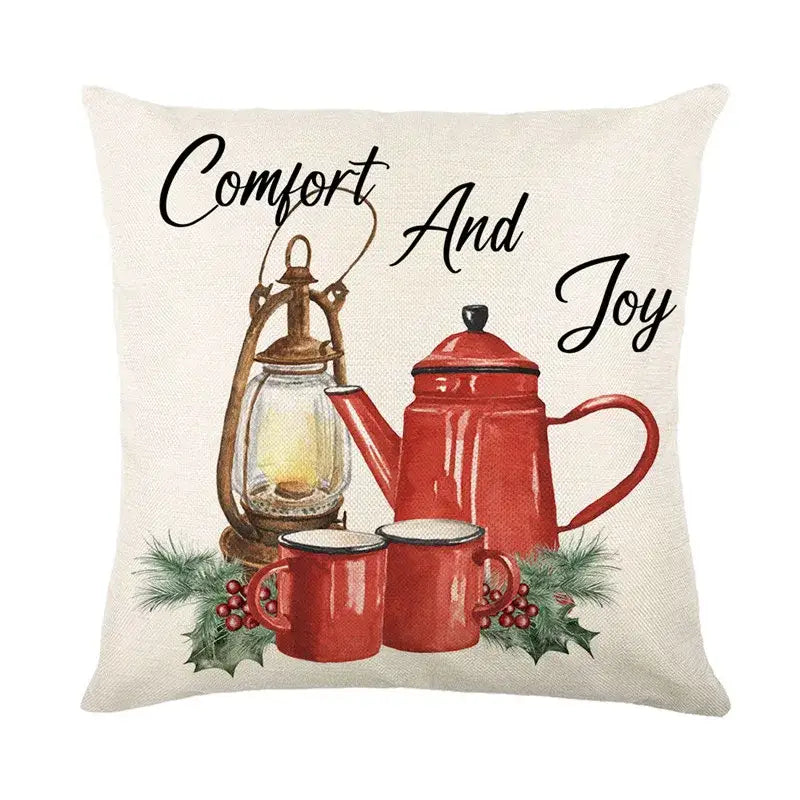 Beige linen pillow cover from decorbites christmas santa featuring red enamelware coffee set and lantern design with comfort and joy text