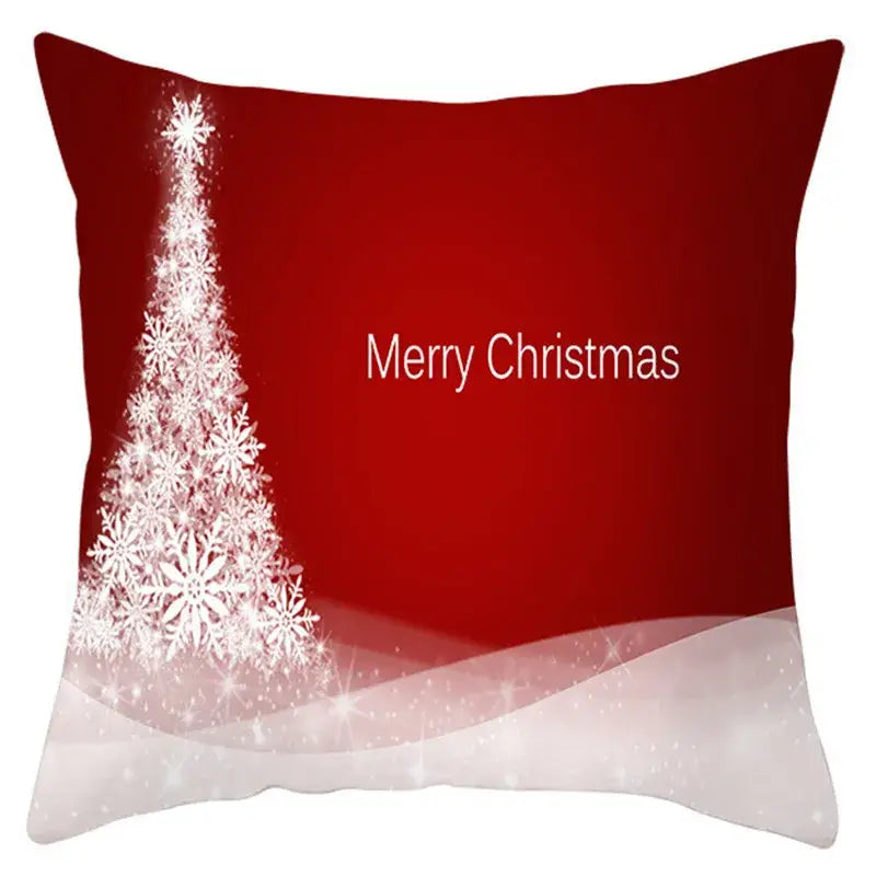 Red christmas-themed pillow cover with white snowflake tree and merry christmas text by decorbites christmas santa