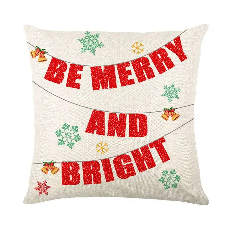 Decorbites christmas snow elk pillow cover with glittery red lettering green and gold snowflakes on natural linen