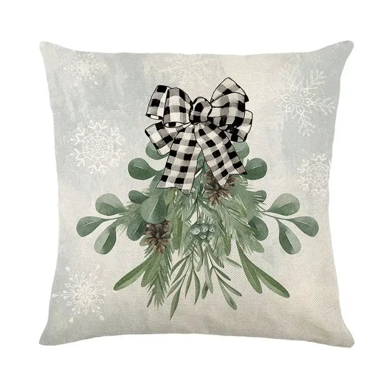 Decorbites christmas snow elk pillow cover with light gray fabric, green foliage embroidery, pinecones, and checkered bow