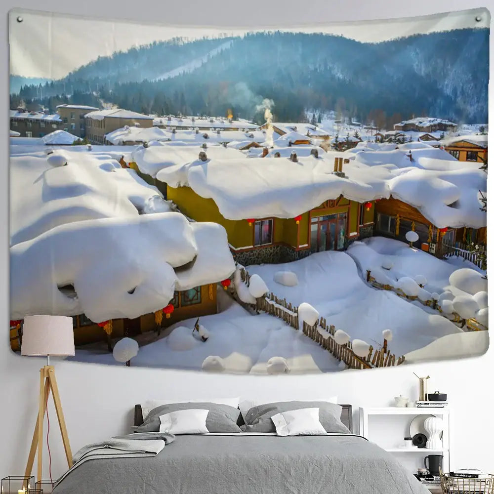 Decorbites christmas snow house tapestry wall hanging featuring snow-covered wooden houses and mountains on fabric