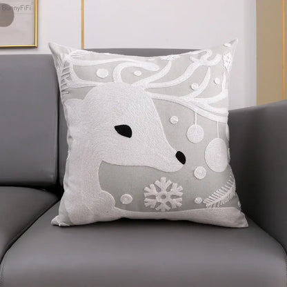 Gray cushion cover featuring embroidered white snowflake deer and ornaments from decorbites christmas snowflake collection