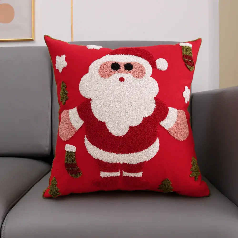 Red christmas-themed cushion cover featuring plush embroidered santa claus with white beard and red suit decorbites christmas snowflake